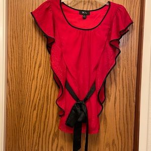 Adorable blouse with satin tie waist.